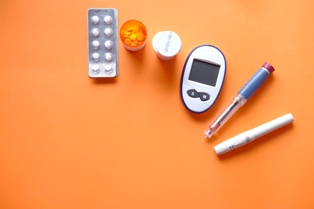 Glucose meter and diabetes supplies representing metabolic health conditions associated with gout.